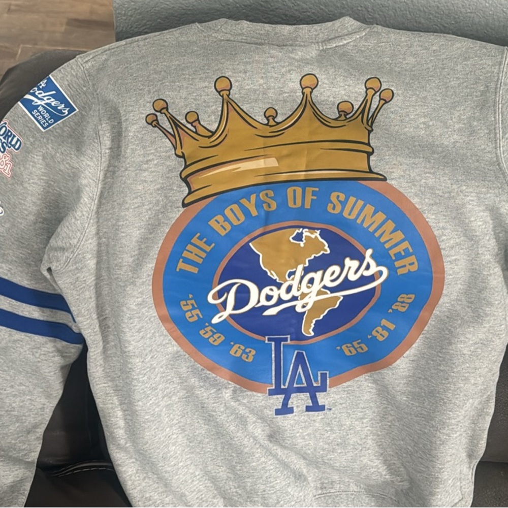 Dodgers sweater paid80 asking $40 Raiders shirt $15 sz M